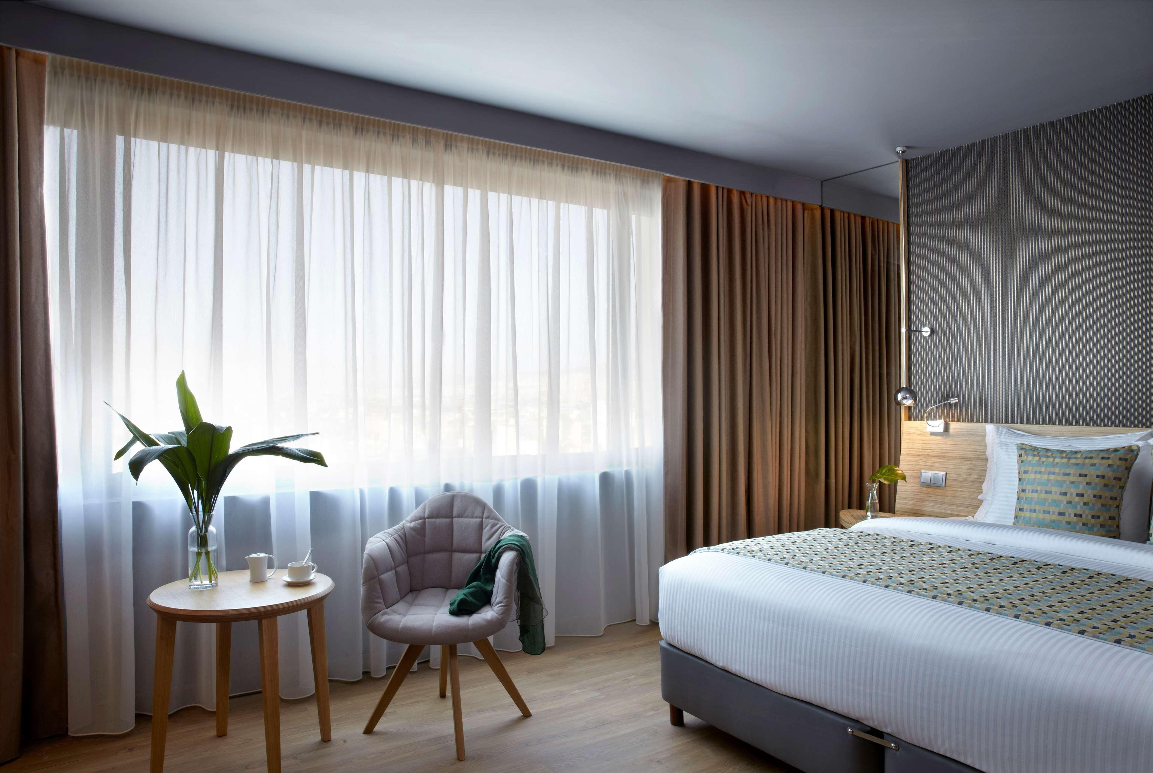 Wyndham Grand Athens Hotel Ngoại thất bức ảnh A room at the hotel