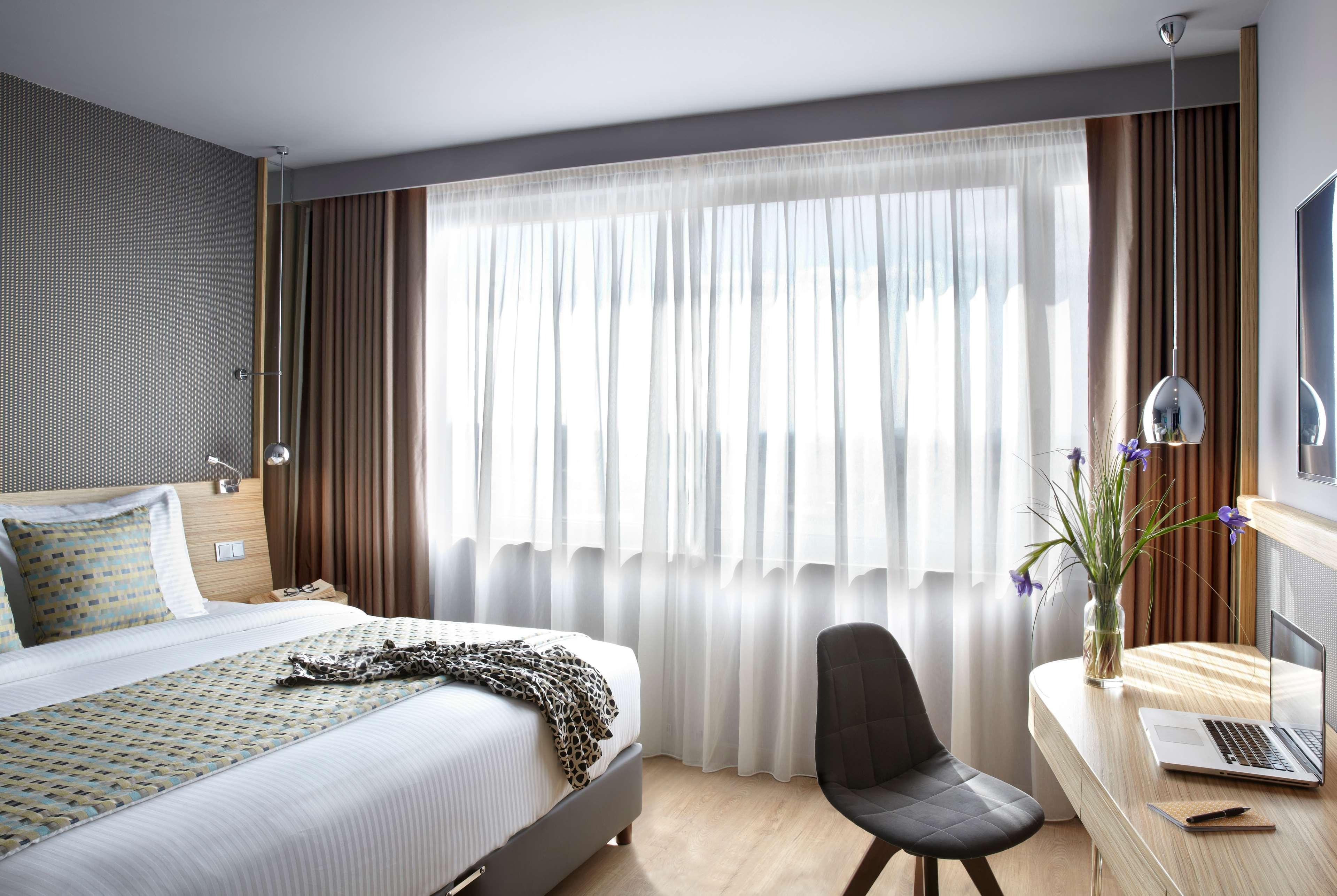 Wyndham Grand Athens Hotel Ngoại thất bức ảnh A room at the hotel