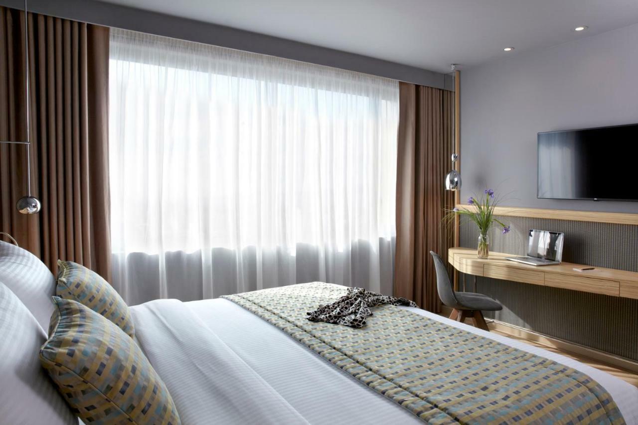 Wyndham Grand Athens Hotel Ngoại thất bức ảnh A bedroom at the hotel