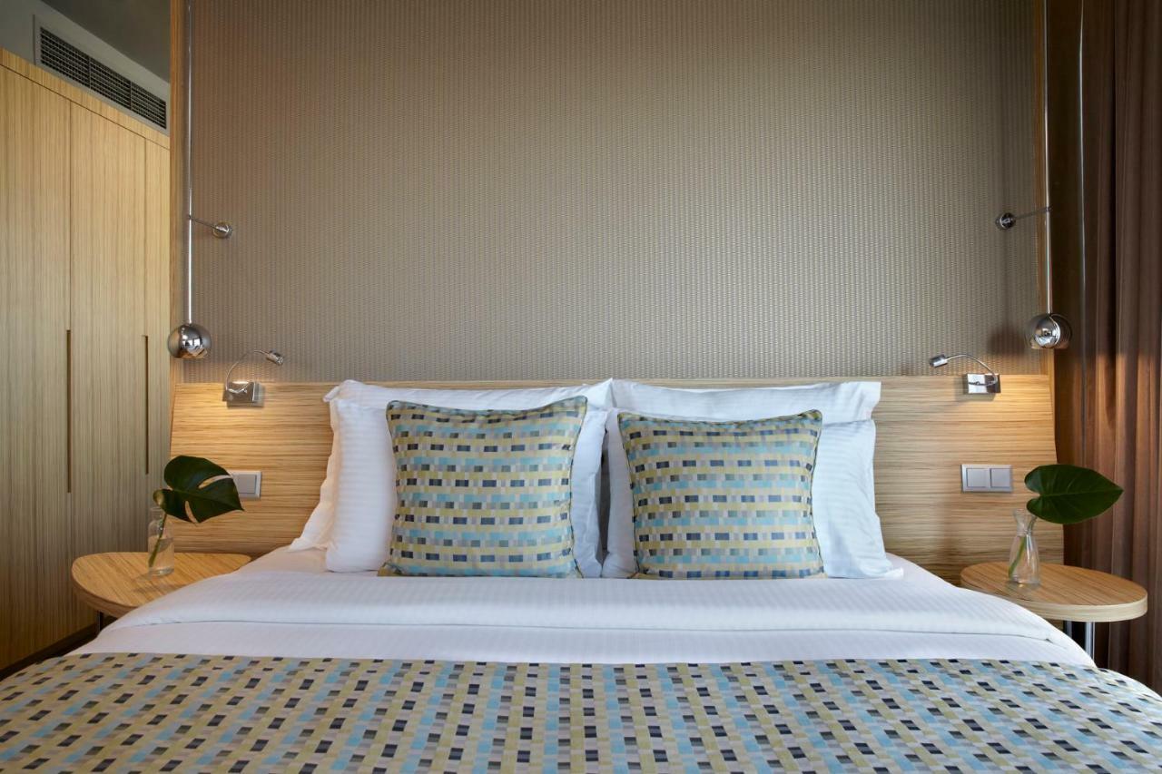 Wyndham Grand Athens Hotel Ngoại thất bức ảnh A bed