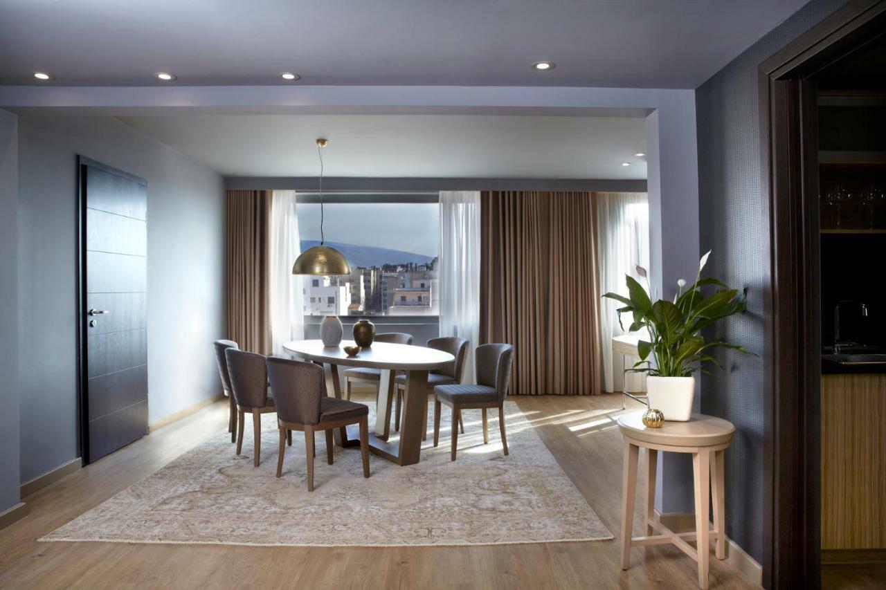 Wyndham Grand Athens Hotel Ngoại thất bức ảnh A dining room